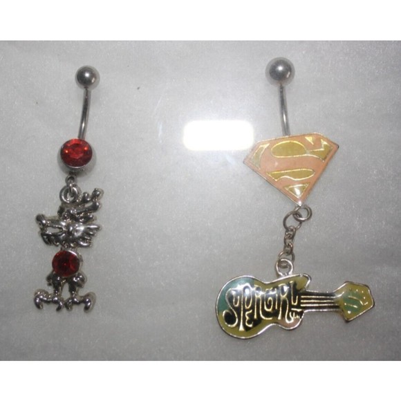 Dragon & Super Girl Belly Rings Set (2) Stainless Steel Red Pink Guitar NWT - Picture 1 of 3